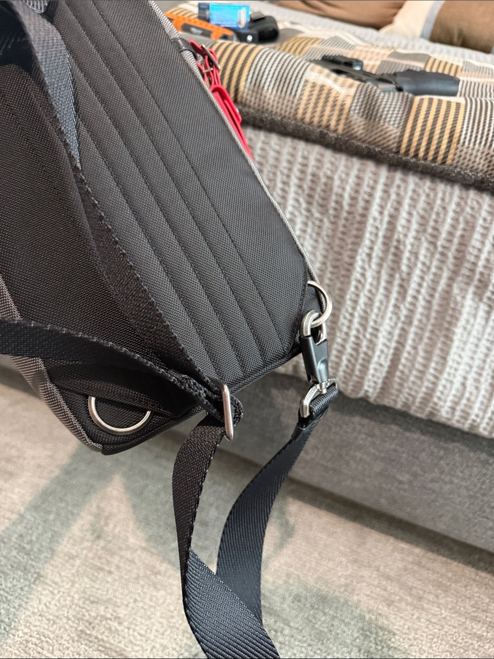 Tumi Gray Sling Bag with Red Accent- NEVER USED OR WORN. Tags removed, A gift - Picture 6 of 9